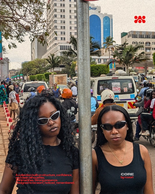 Two women in black outfits and Ruvori sunglasses on a busy city street.